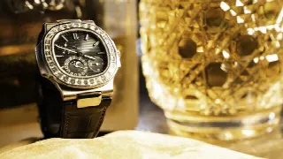 Foto 11 di 11: Patek Philippe Nautilus - Riserva oro bianco brillanti
