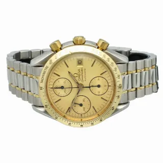 Foto 3 di 6: Omega Speedmaster Reduced 39 MM Goud/Staal